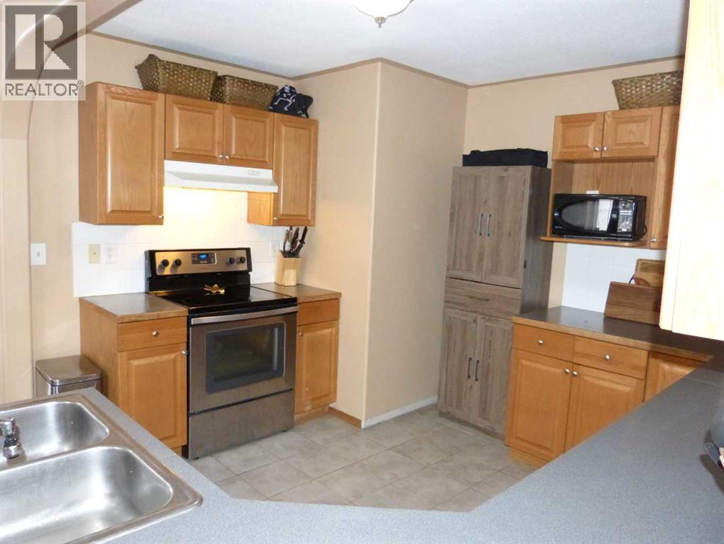 418 9 Street, Beiseker, Alberta  T0M 0G0 - Photo 12 - A2283055