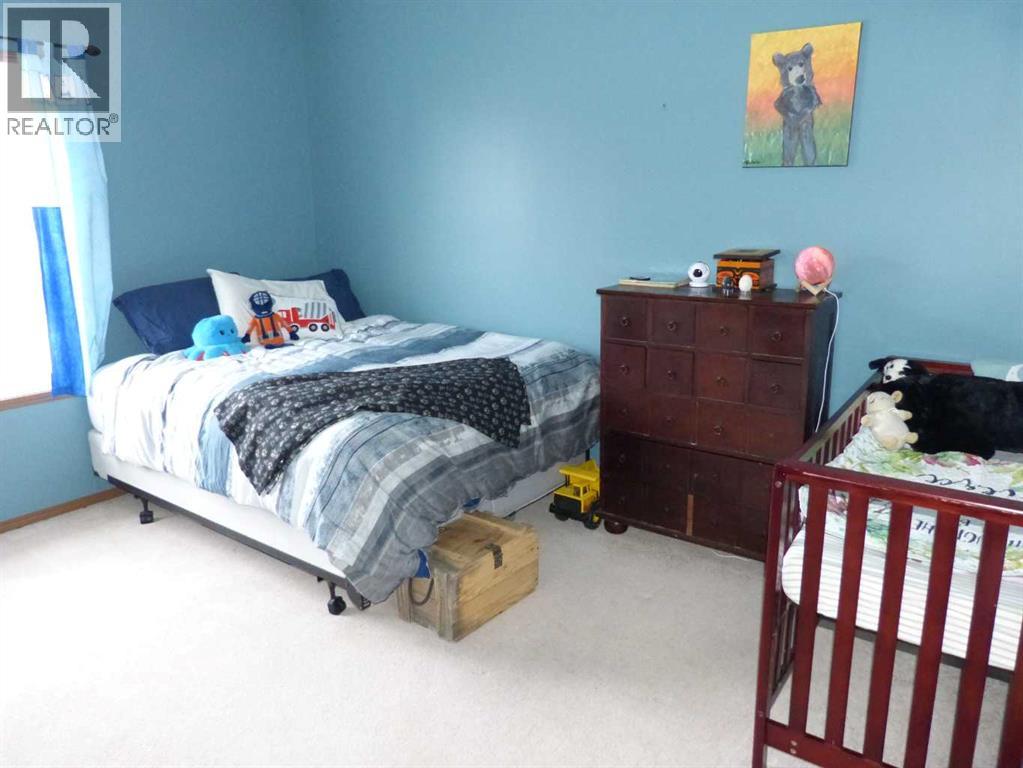 418 9 Street, Beiseker, Alberta  T0M 0G0 - Photo 27 - A2283055