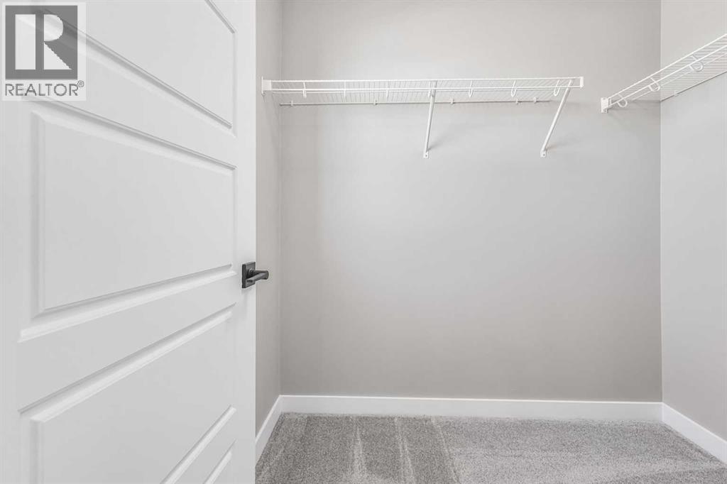 423 Hotchkiss Manor, Calgary, Alberta  T3S 0N3 - Photo 28 - A2283550