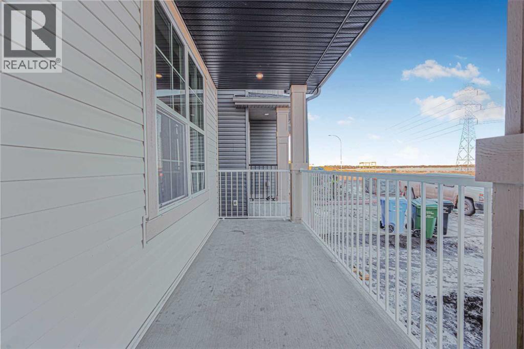 423 Hotchkiss Manor, Calgary, Alberta  T3S 0N3 - Photo 3 - A2283550