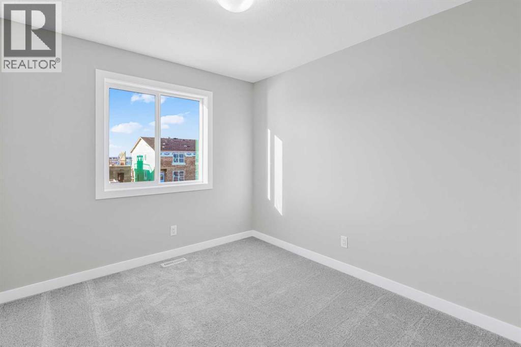 423 Hotchkiss Manor, Calgary, Alberta  T3S 0N3 - Photo 31 - A2283550