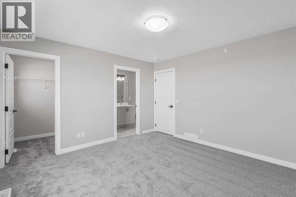 423 Hotchkiss Manor, Calgary, Alberta  T3S 0N3 - Photo 26 - A2283550