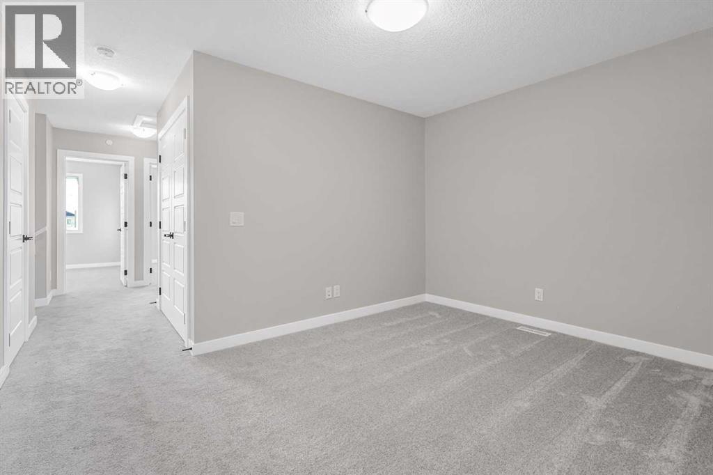 423 Hotchkiss Manor, Calgary, Alberta  T3S 0N3 - Photo 23 - A2283550