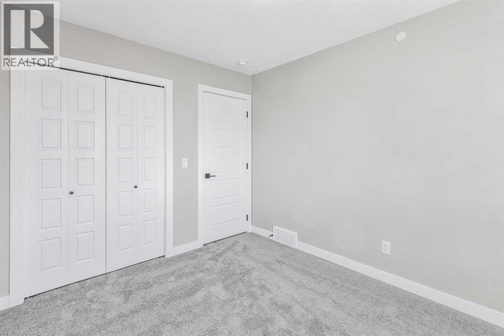 423 Hotchkiss Manor, Calgary, Alberta  T3S 0N3 - Photo 32 - A2283550