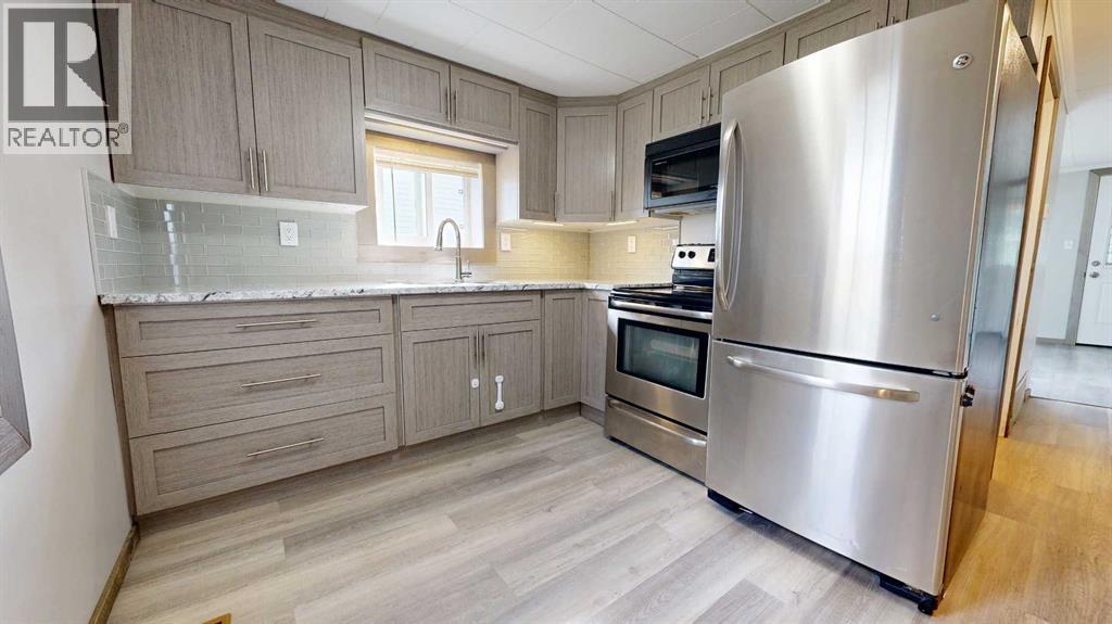 10520 101 Avenue, Grande Prairie, Alberta  T8V 0Z1 - Photo 5 - A2259455