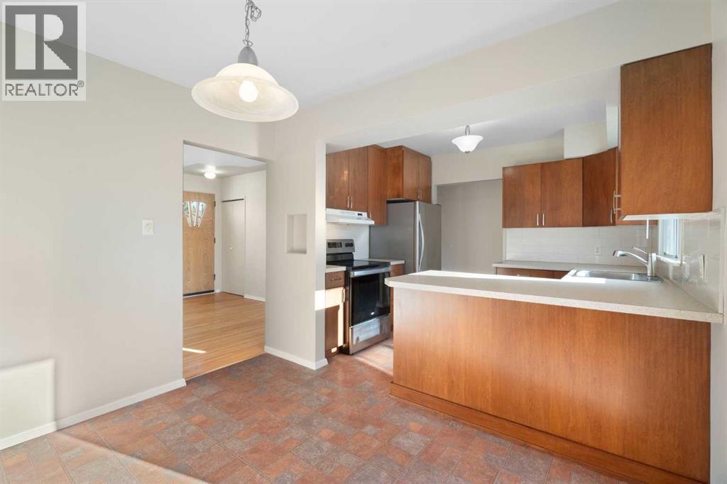 19 Carmangay Crescent Nw, Calgary, Alberta  T2L 0S8 - Photo 6 - A2284236