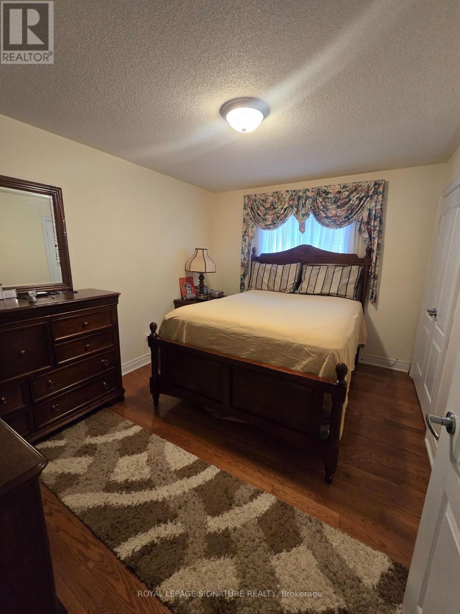 Upper Bedroom - 19 Red Plant Crescent, Brampton, Ontario  L7A 1V8 - Photo 3 - W12766462