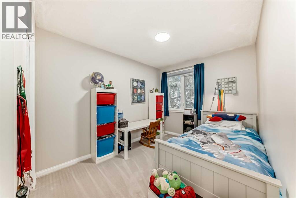 21 Woodfern Road Sw, Calgary, Alberta  T2W 4Y4 - Photo 22 - A2284186