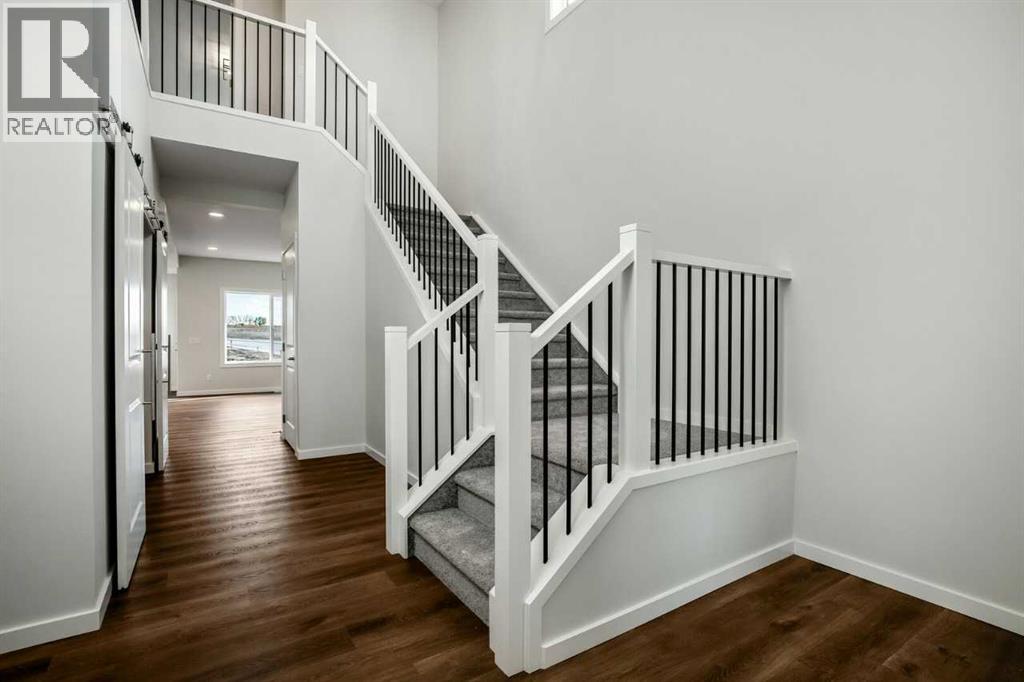 27 Heritage Link, Cochrane, Alberta  T4C 2J8 - Photo 4 - A2249127