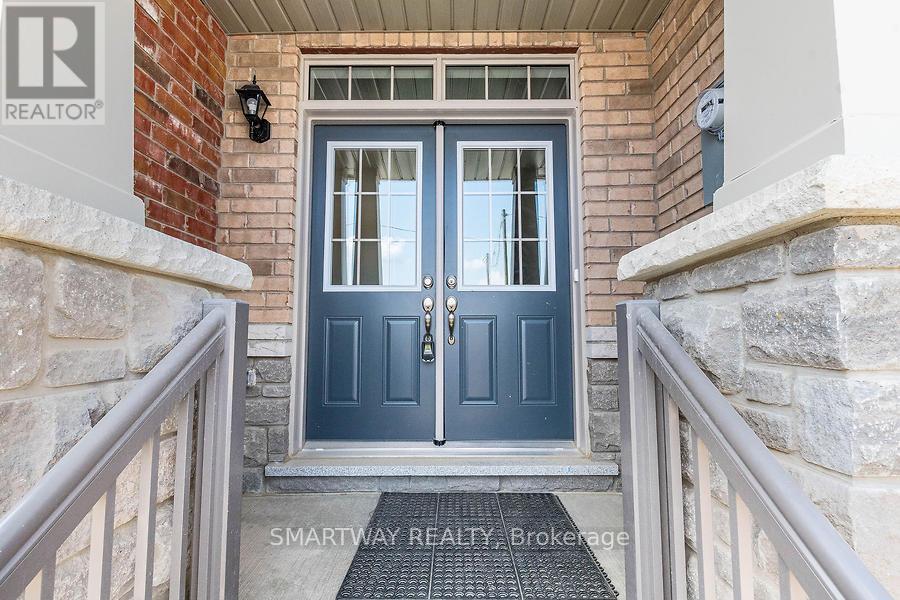 7 Bushwood Trail, Brampton, Ontario  L7A 5J7 - Photo 3 - W12771516