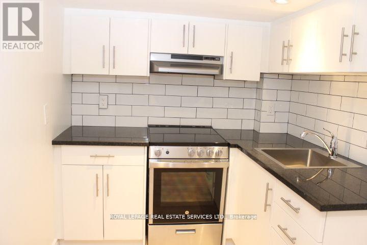 Lower - 242 Keele Street, Toronto, Ontario  M6P 2K3 - Photo 2 - W12771798