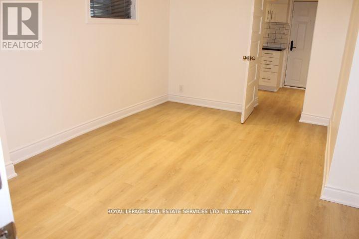 Lower - 242 Keele Street, Toronto, Ontario  M6P 2K3 - Photo 9 - W12771798