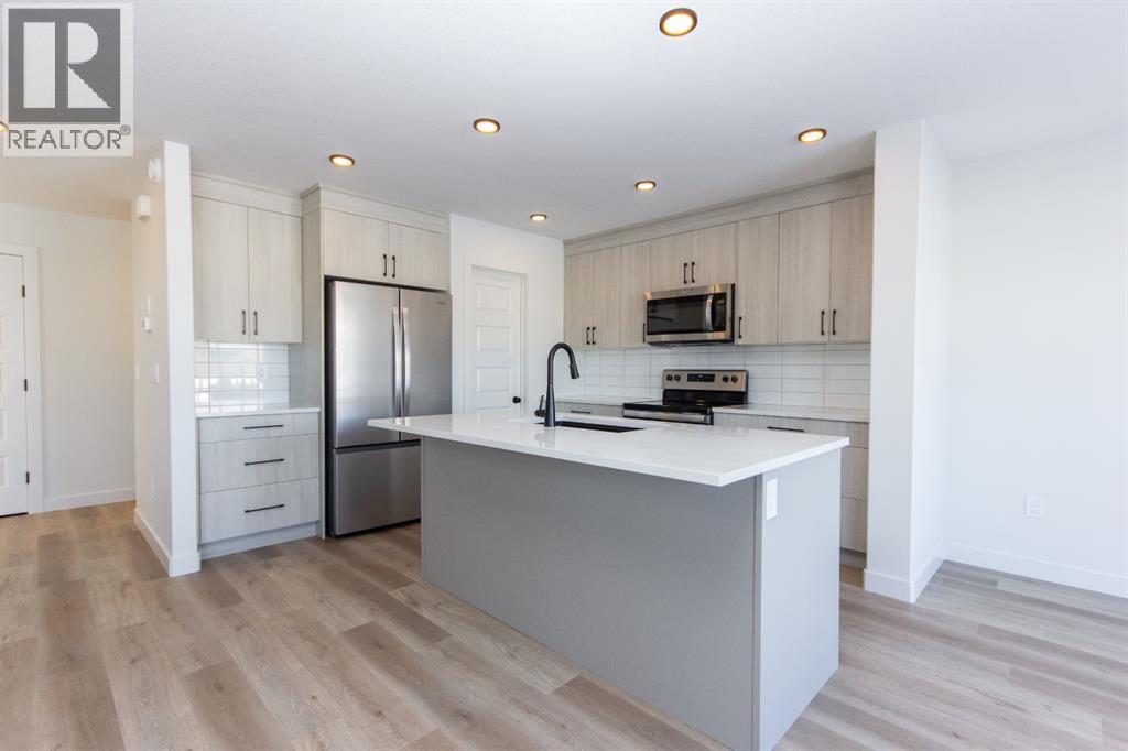 260 Augustus Way, Penhold, Alberta  T0M 1R0 - Photo 5 - A2272164