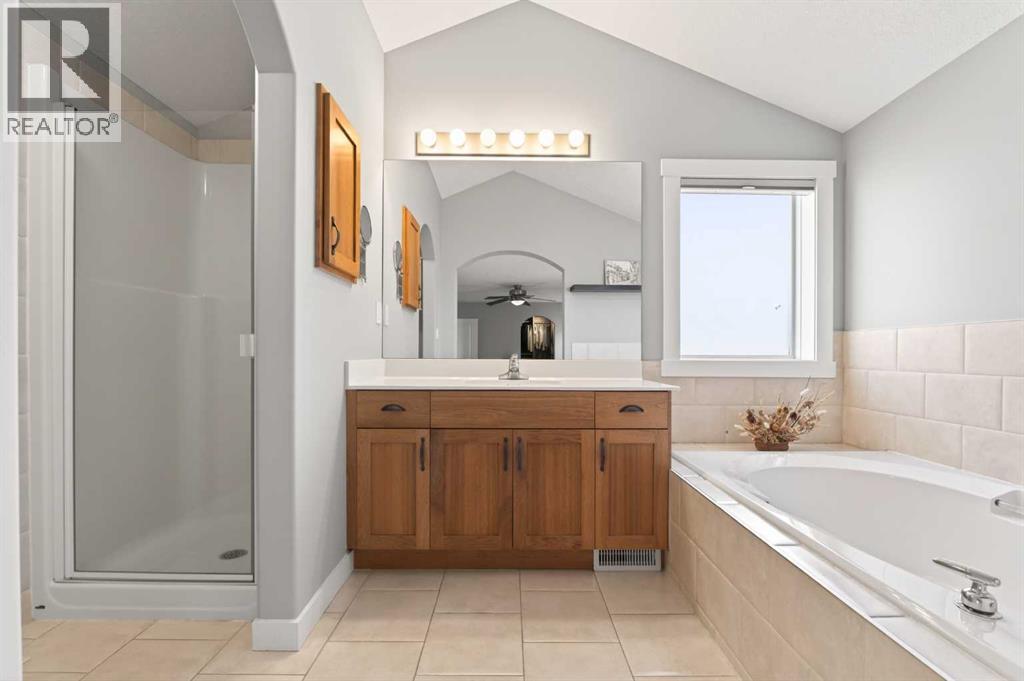 4 Cougarstone Square Sw, Calgary, Alberta  T3H 5J3 - Photo 30 - A2283347