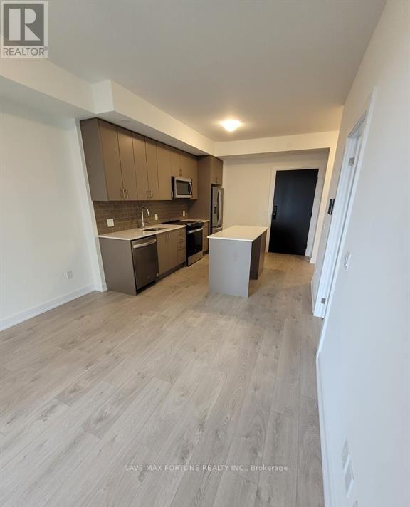 1113 - 3220 William Coltson Avenue N, Oakville, Ontario  L6H 7C2 - Photo 4 - W12771924