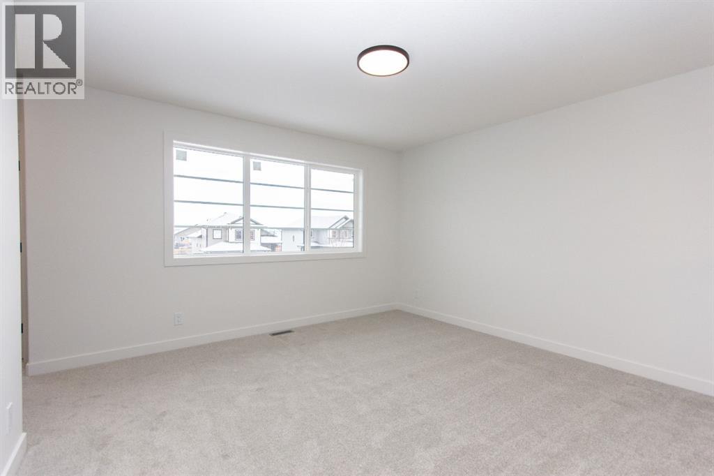 12 Trinity Street, Lacombe, Alberta  T4L 0L1 - Photo 21 - A2282020