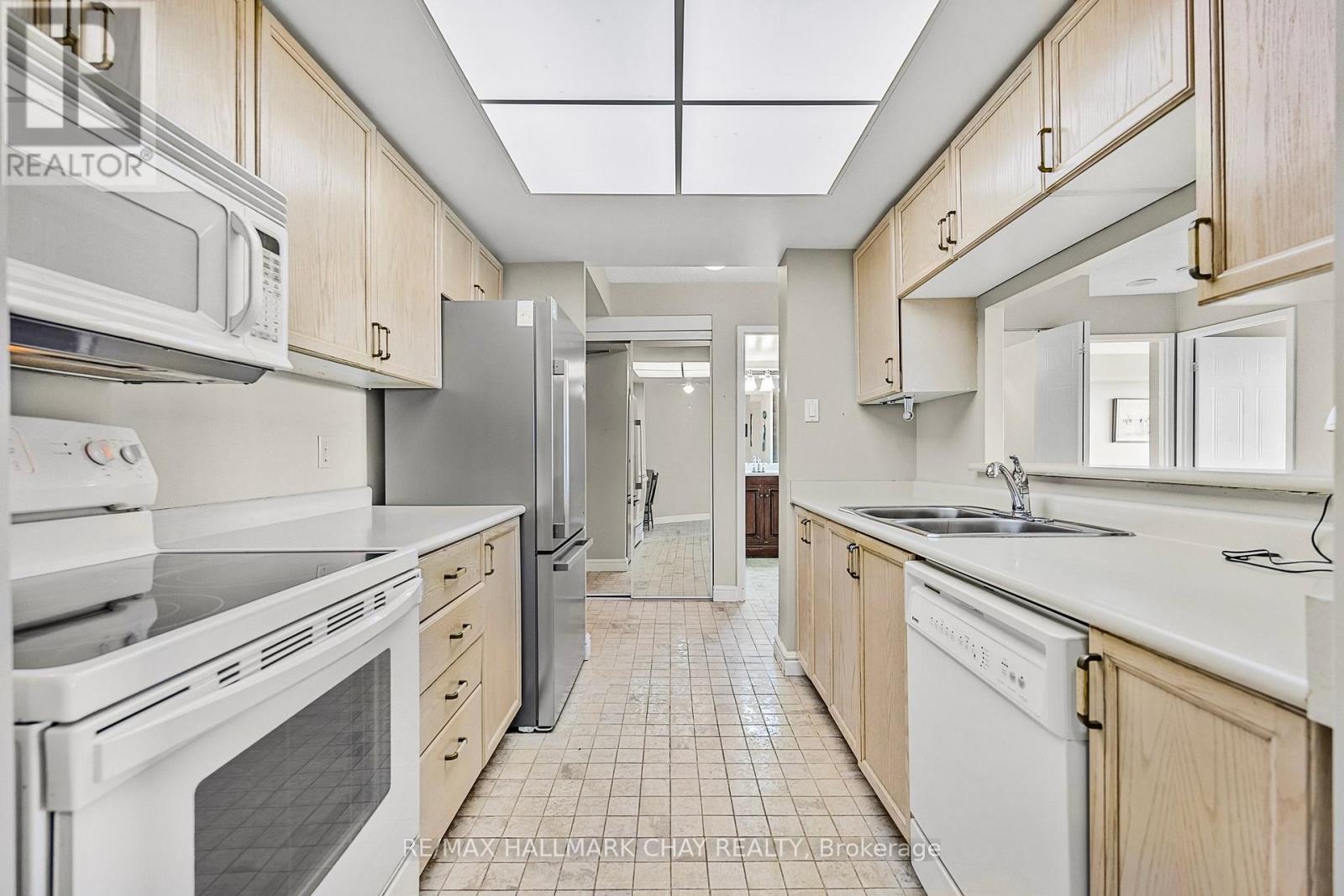 205 - 65 Ellen Street, Barrie, Ontario  L4N 3A5 - Photo 4 - S12772012