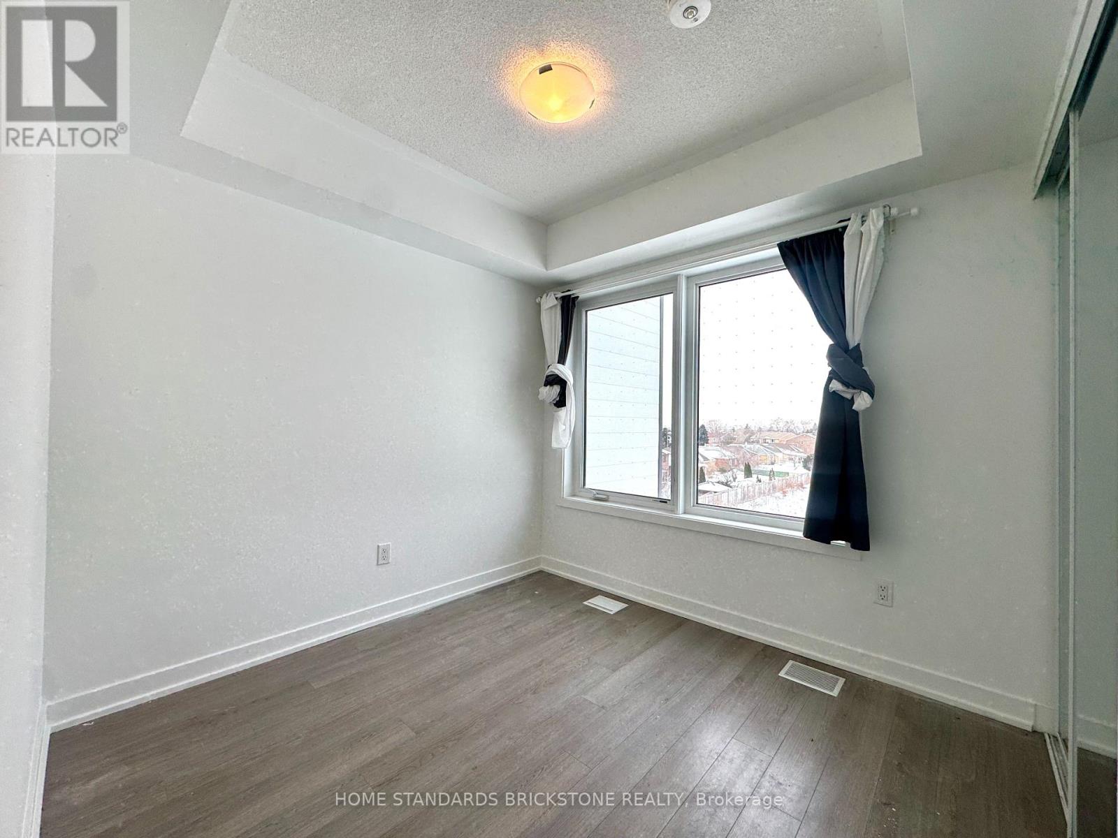 207 - 155 Downsview Park Boulevard, Toronto, Ontario  M3K 0E3 - Photo 13 - W12772376