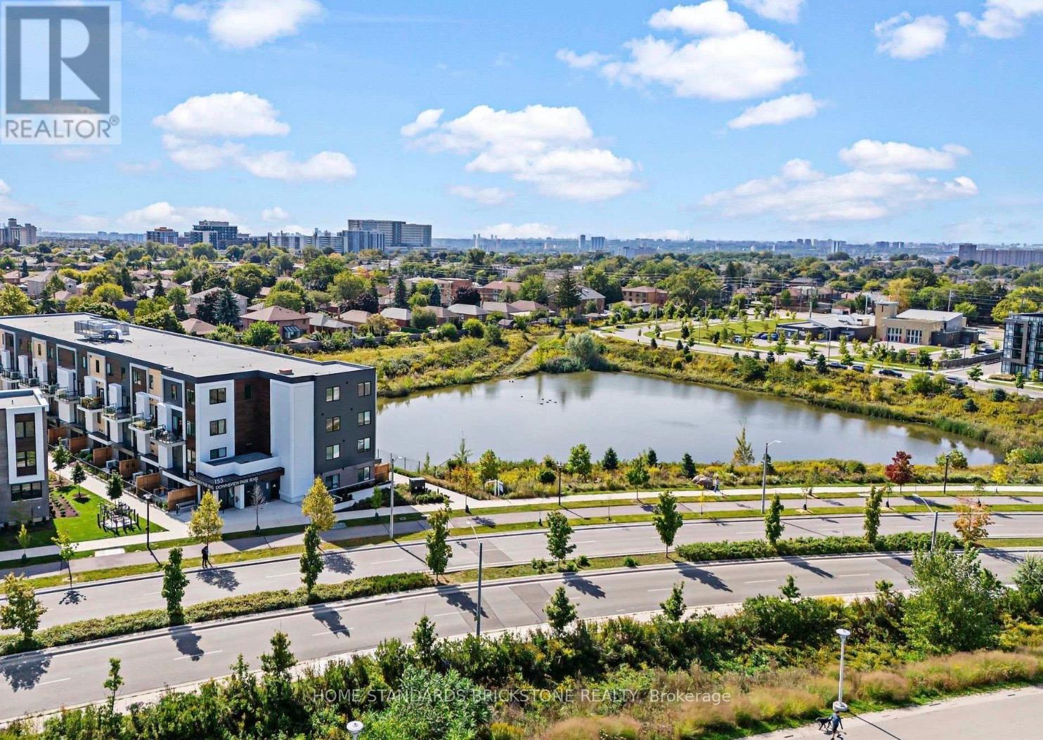 207 - 155 Downsview Park Boulevard, Toronto, Ontario  M3K 0E3 - Photo 3 - W12772376