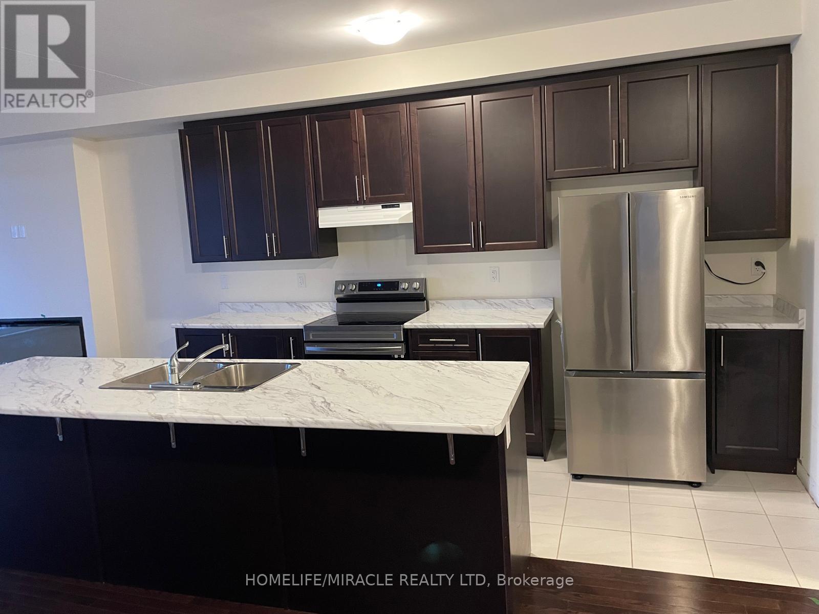 78 Donald Ficht Crescent, Brampton, Ontario  L7A 5H7 - Photo 2 - W12772634