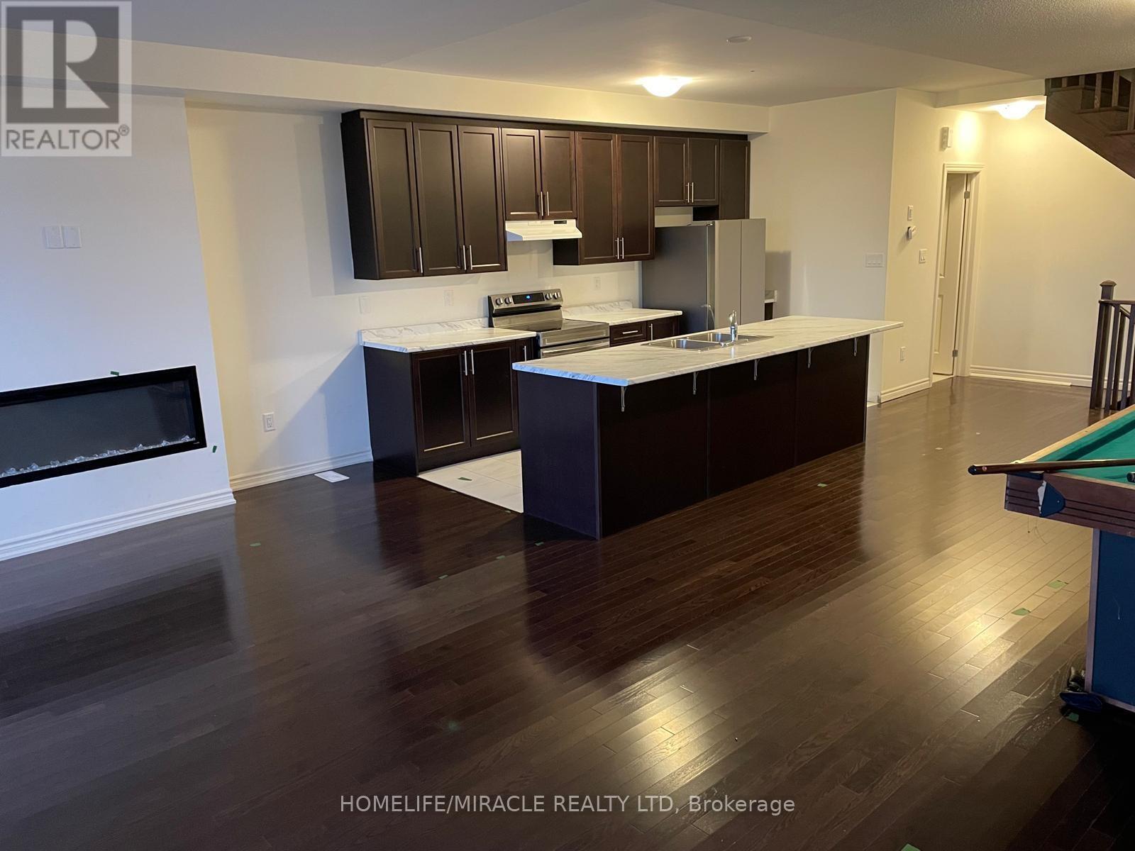 78 Donald Ficht Crescent, Brampton, Ontario  L7A 5H7 - Photo 4 - W12772634