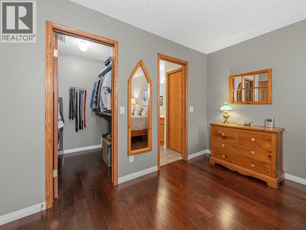 301 Arbour Cliff Close Nw, Calgary, Alberta  T3G 3W8 - Photo 13 - A2284425