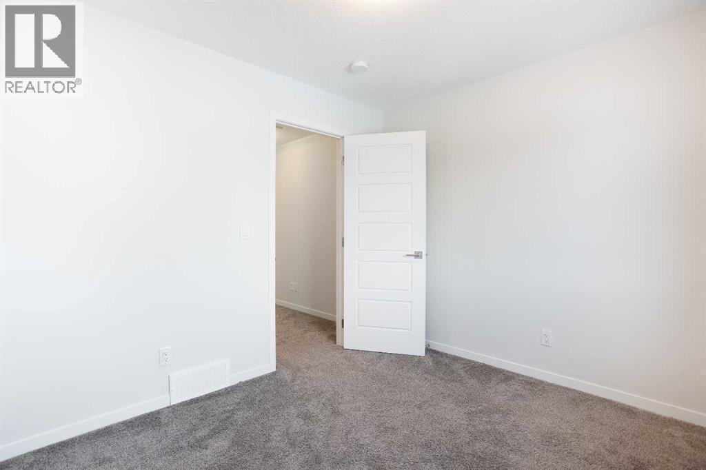 16 Creekstone Drive Sw, Calgary, Alberta  T2X 4Z5 - Photo 26 - A2281800