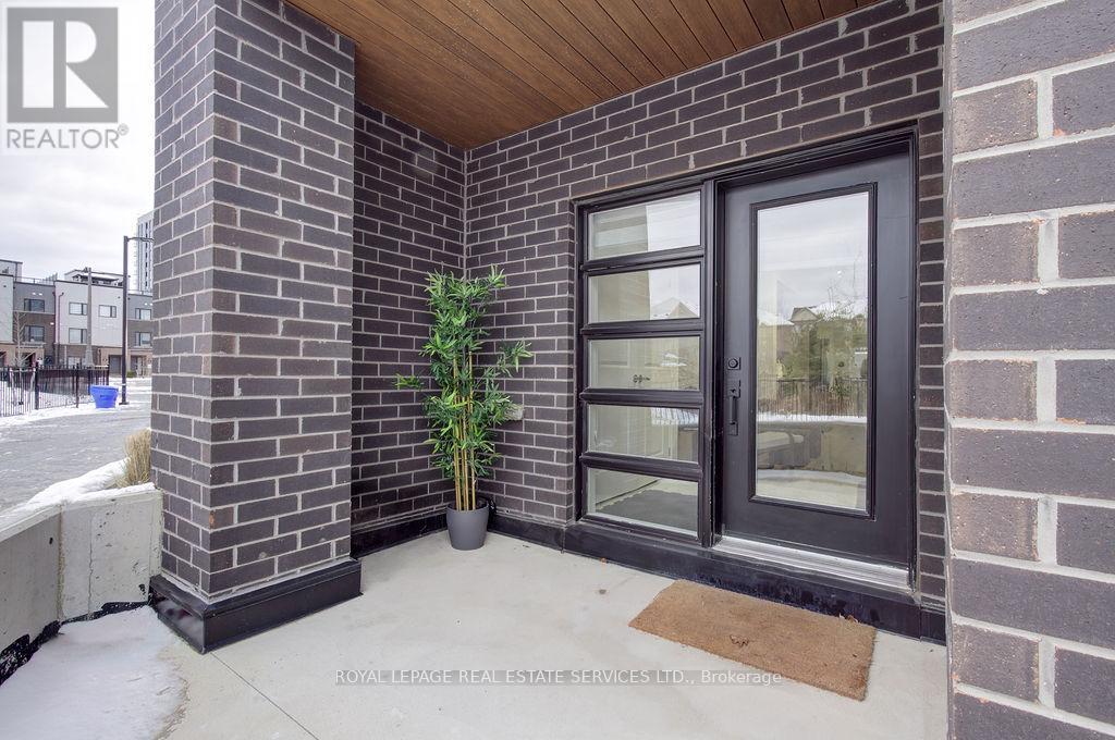 123 - 349 Wheat Boom Drive E, Oakville, Ontario  L6H 7X5 - Photo 1 - W12773018