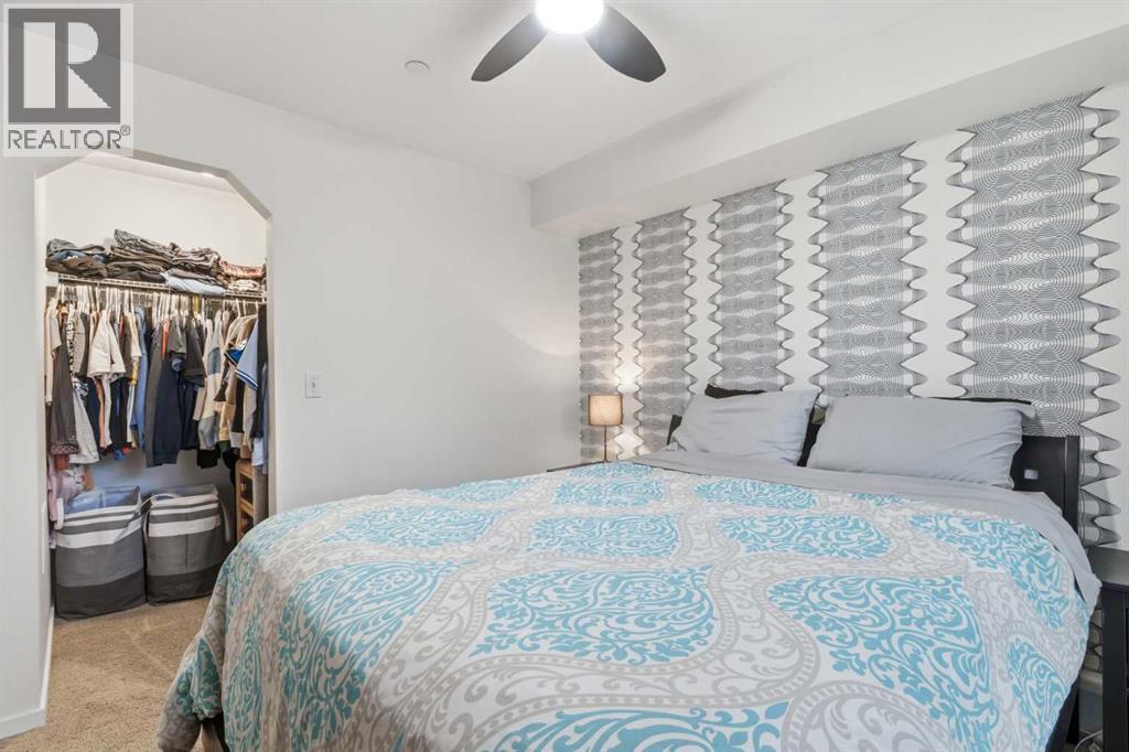 1102, 755 Copperpond Boulevard Se, Calgary, Alberta  T2Z 4R2 - Photo 13 - A2282275