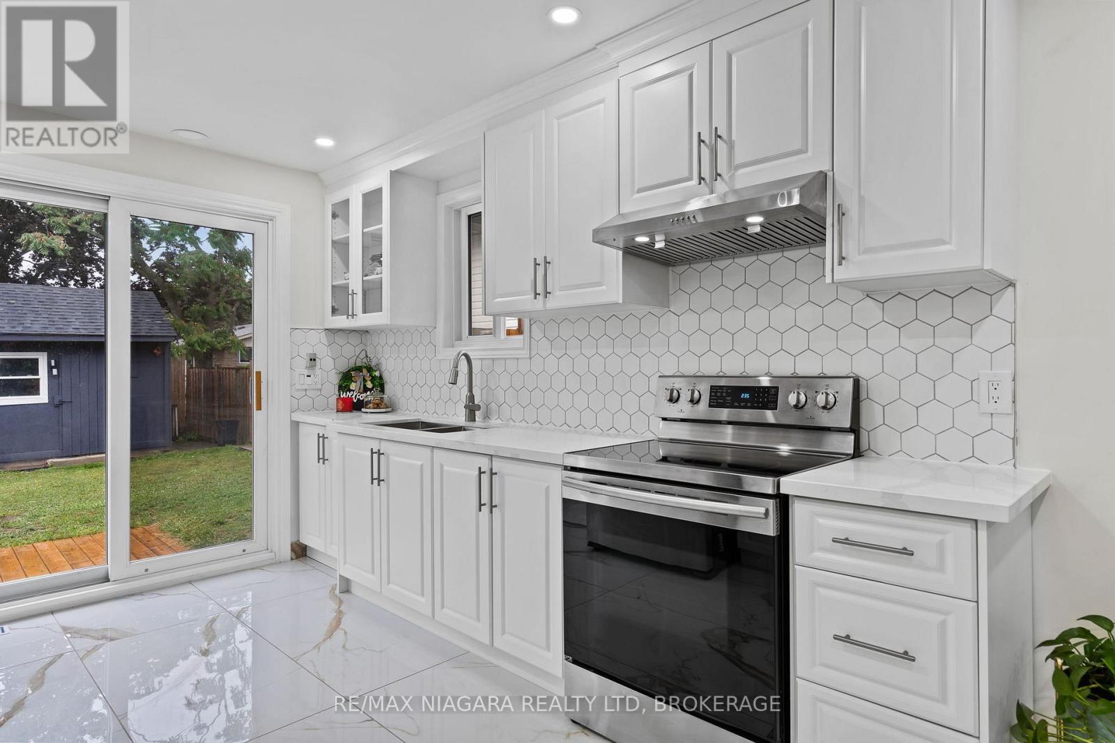 57 Woodrow Street, St. Catharines (Secord Woods), Ontario  L2P 2A4 - Photo 13 - X12773514