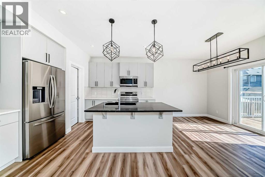 105 Creekside Way Sw, Calgary, Alberta  T2X 4A9 - Photo 6 - A2276832