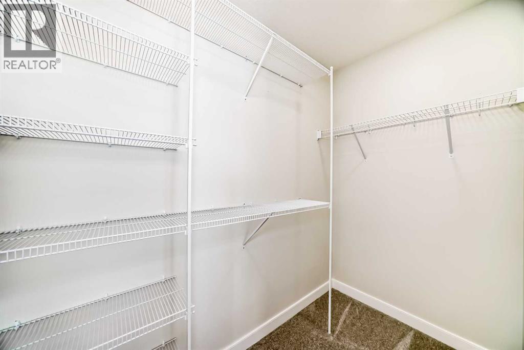 105 Creekside Way Sw, Calgary, Alberta  T2X 4A9 - Photo 35 - A2276832