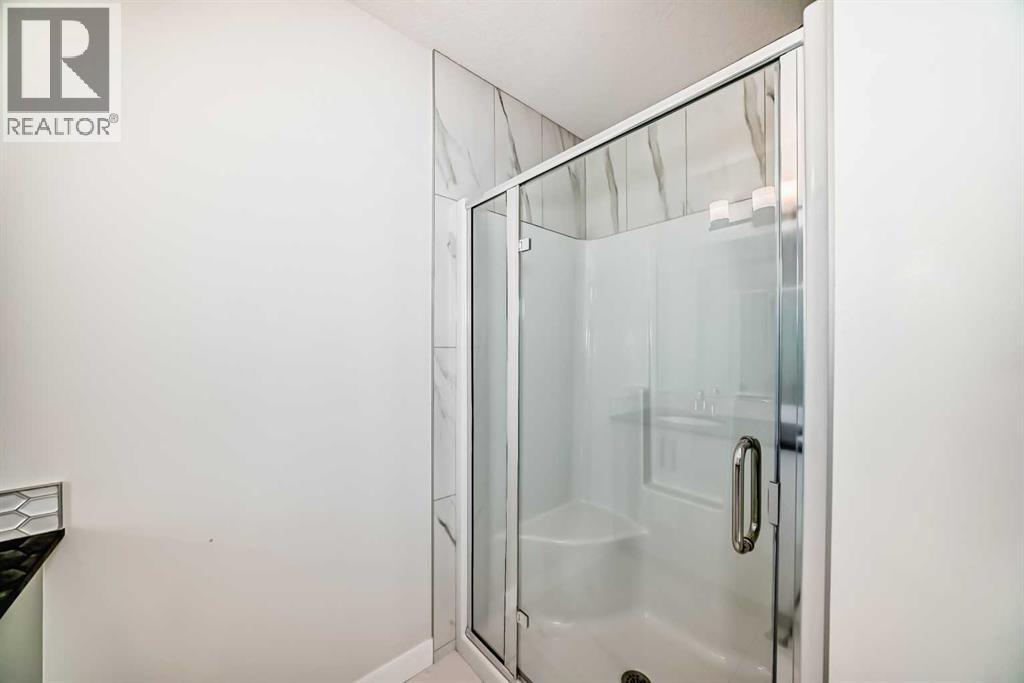 105 Creekside Way Sw, Calgary, Alberta  T2X 4A9 - Photo 34 - A2276832