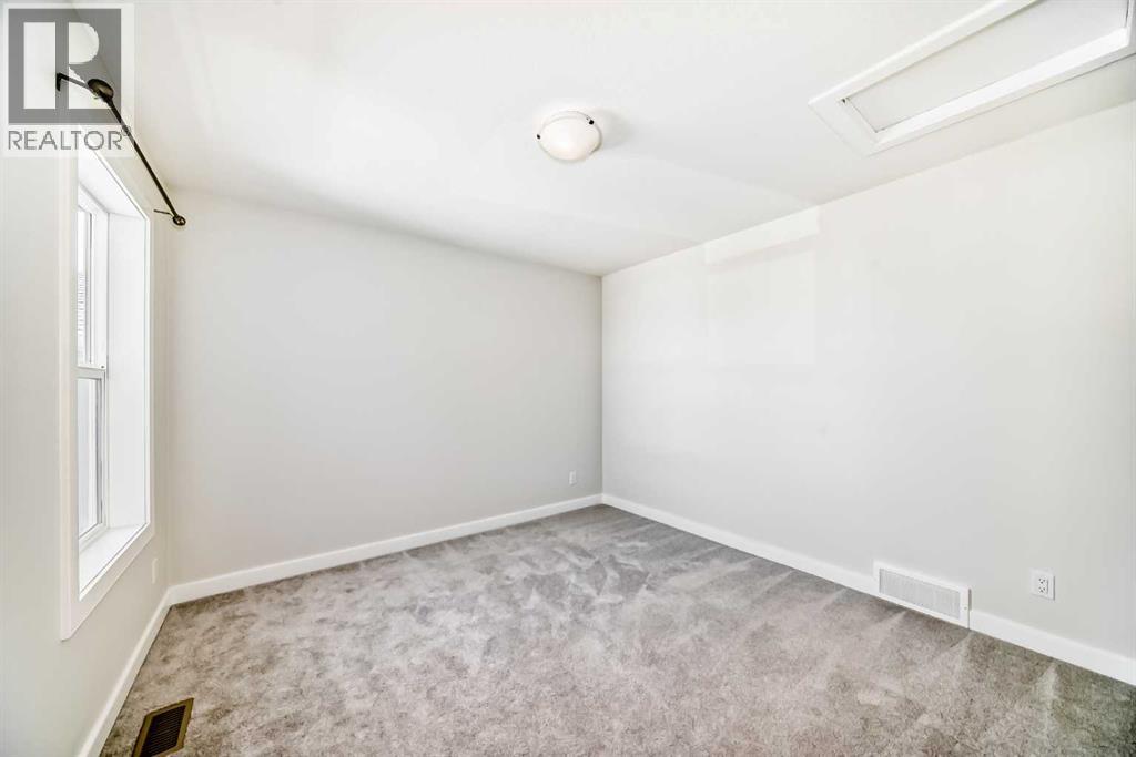 105 Creekside Way Sw, Calgary, Alberta  T2X 4A9 - Photo 39 - A2276832