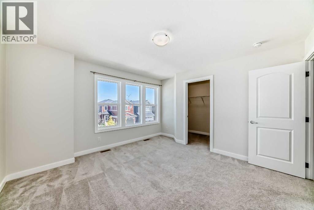 105 Creekside Way Sw, Calgary, Alberta  T2X 4A9 - Photo 37 - A2276832