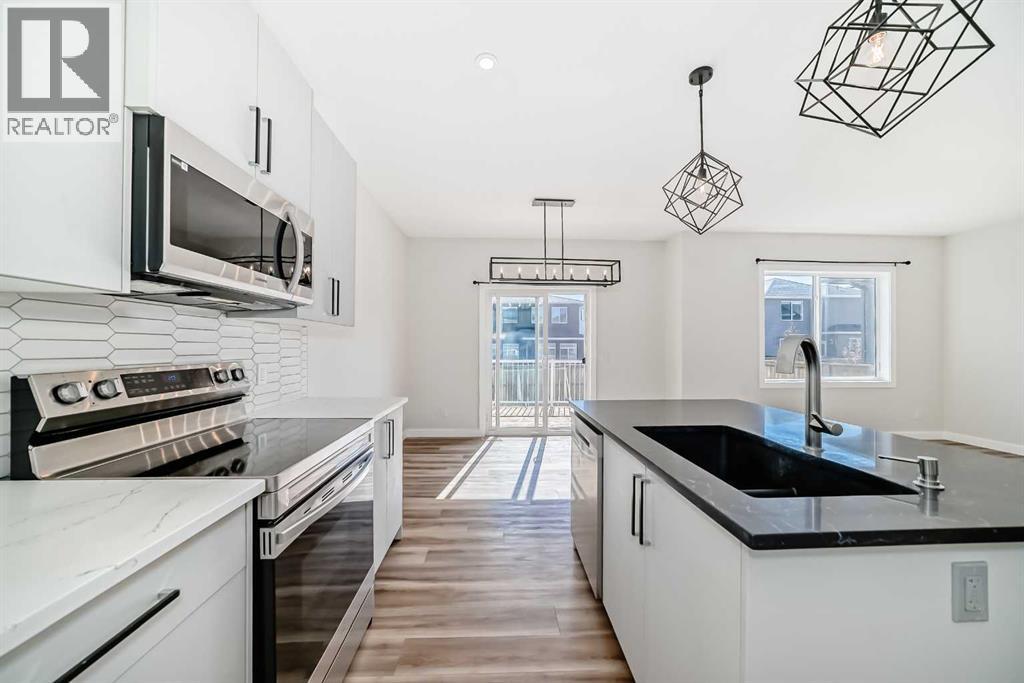 105 Creekside Way Sw, Calgary, Alberta  T2X 4A9 - Photo 9 - A2276832