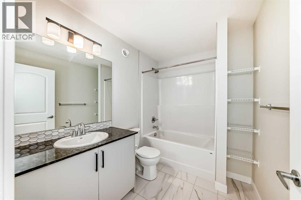 105 Creekside Way Sw, Calgary, Alberta  T2X 4A9 - Photo 42 - A2276832