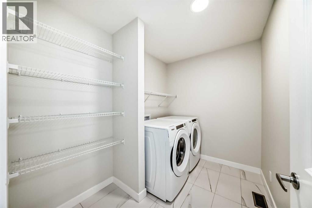 105 Creekside Way Sw, Calgary, Alberta  T2X 4A9 - Photo 43 - A2276832