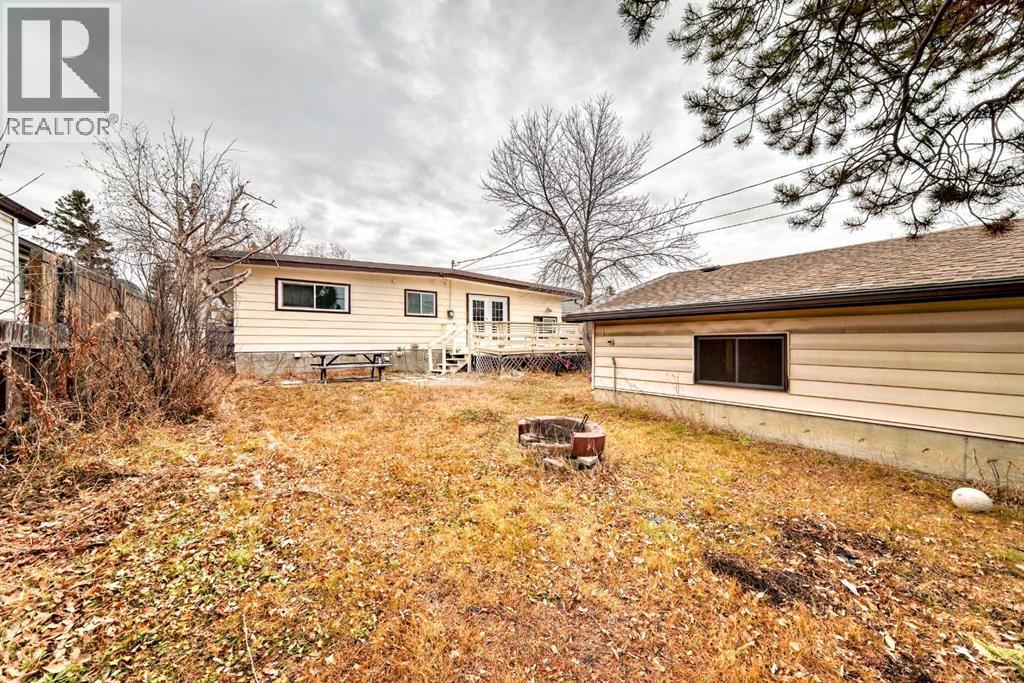 307 Huntridge Road Ne, Calgary, Alberta  T2K 4B8 - Photo 48 - A2272014