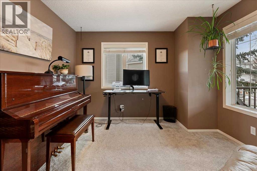 128 West Terrace Crescent, Cochrane, Alberta  T4C 1R3 - Photo 11 - A2284095