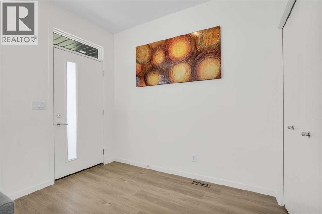 145 South Point Greenway Sw, Airdrie, Alberta  T4B 5J3 - Photo 4 - A2283699