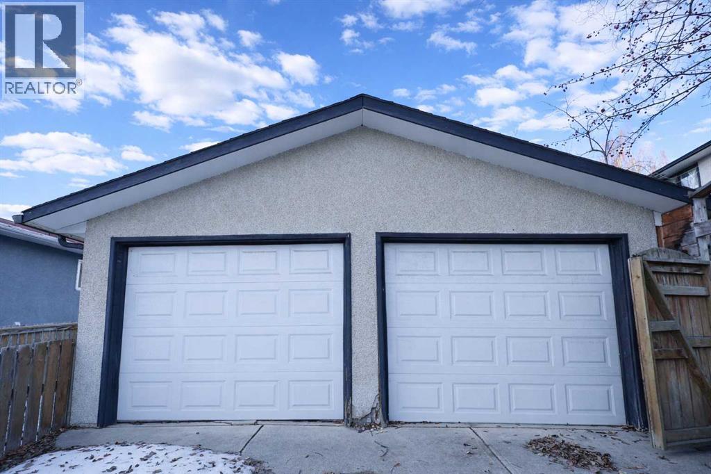 102 Dalgleish Bay Nw, Calgary, Alberta  T3A 1K8 - Photo 37 - A2280097