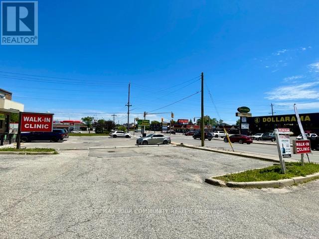 100 A - 107 Holland Street, Bradford West Gwillimbury, Ontario  L9N 1C3 - Photo 2 - N12483159