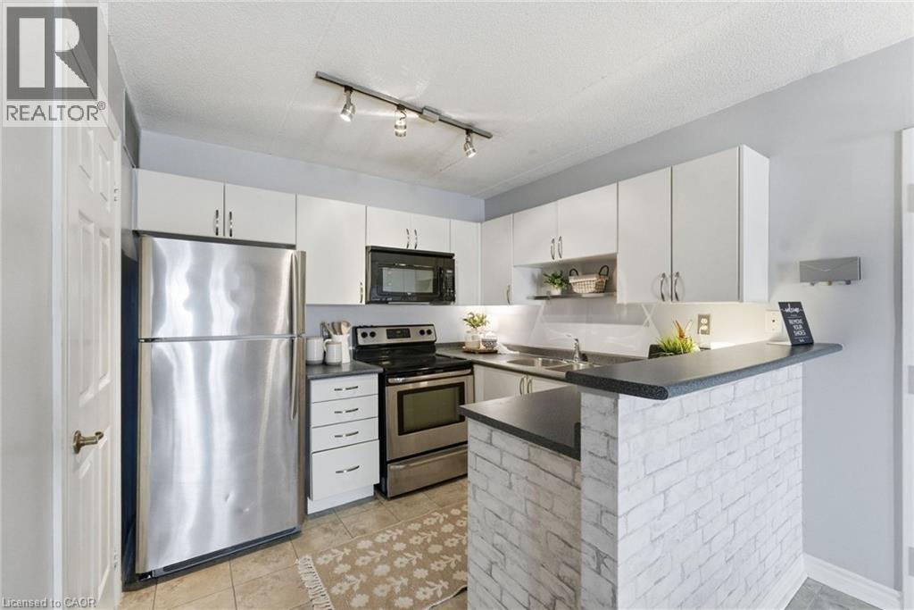 1421 Walkers Line Unit# 304, Burlington, Ontario  L7M 4P4 - Photo 8 - 40775506