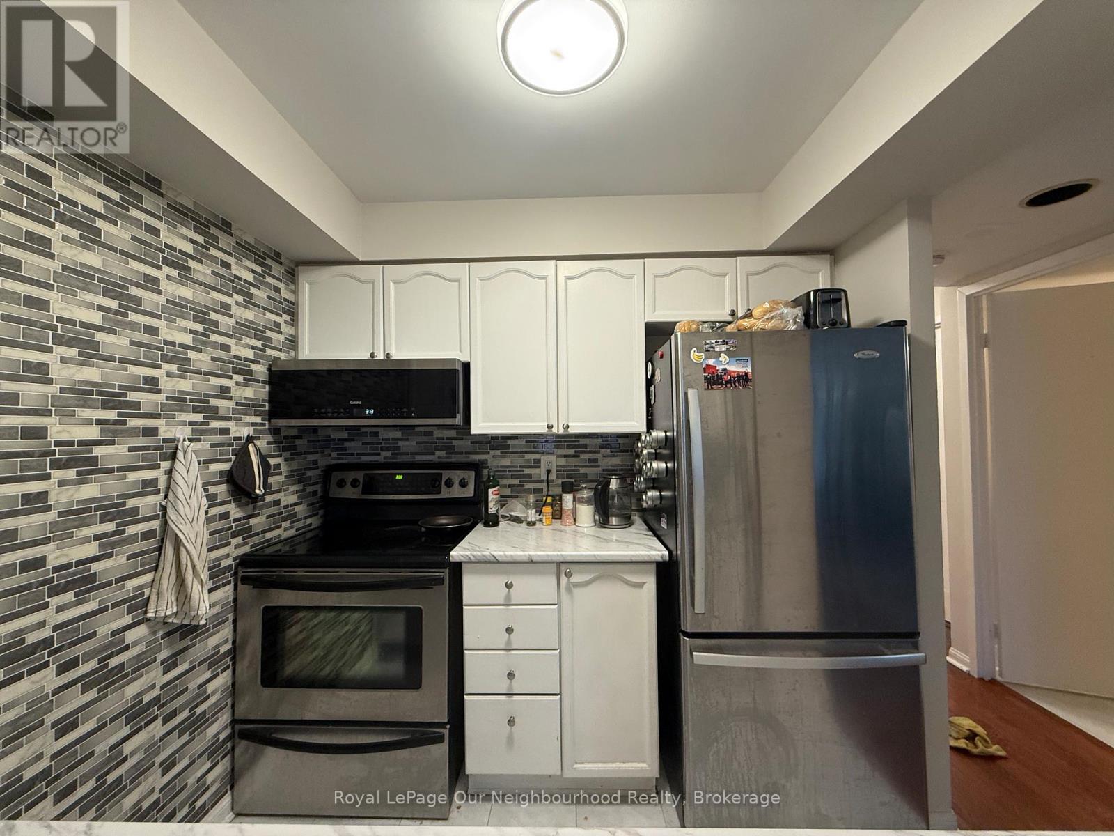 303 - 1 Hickory Tree Road, Toronto, Ontario  M9N 3W4 - Photo 2 - W12775528