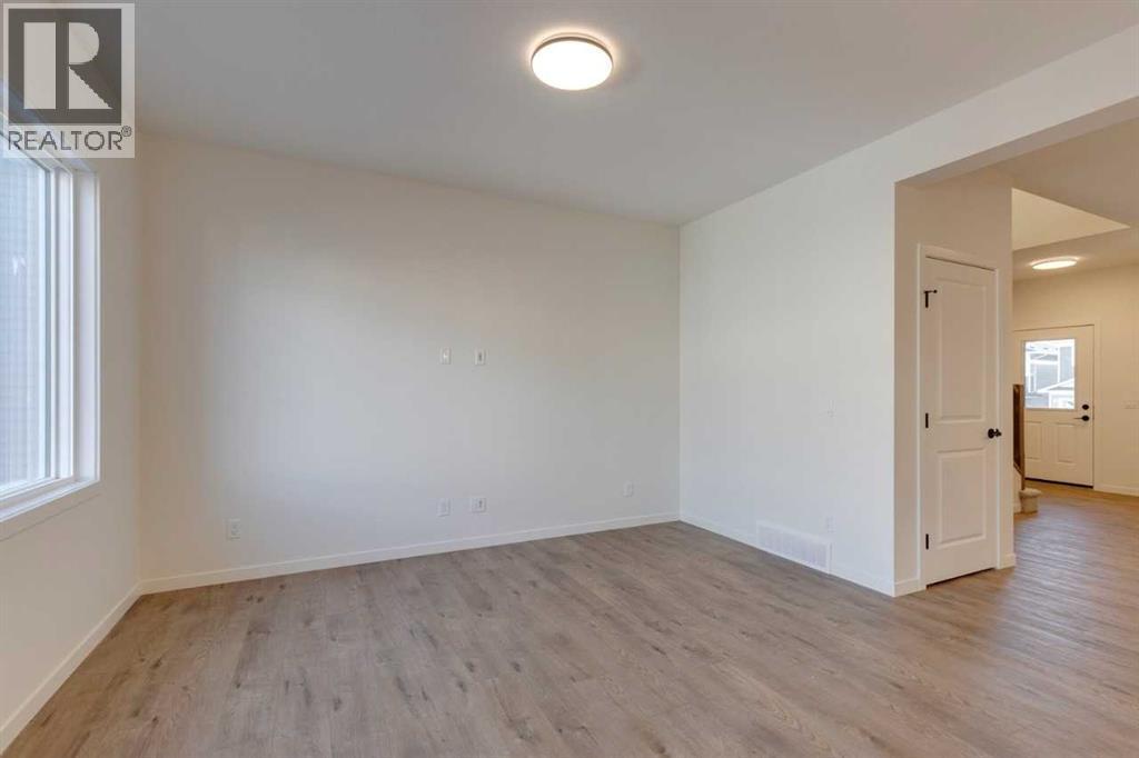 1419 Bayview Crescent Sw, Airdrie, Alberta  T4B 3N6 - Photo 14 - A2270739