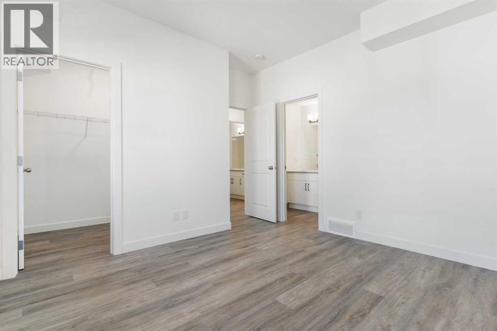 605, 24 Rivercrest Drive, Cochrane, Alberta  T4C 2C5 - Photo 32 - A2267491