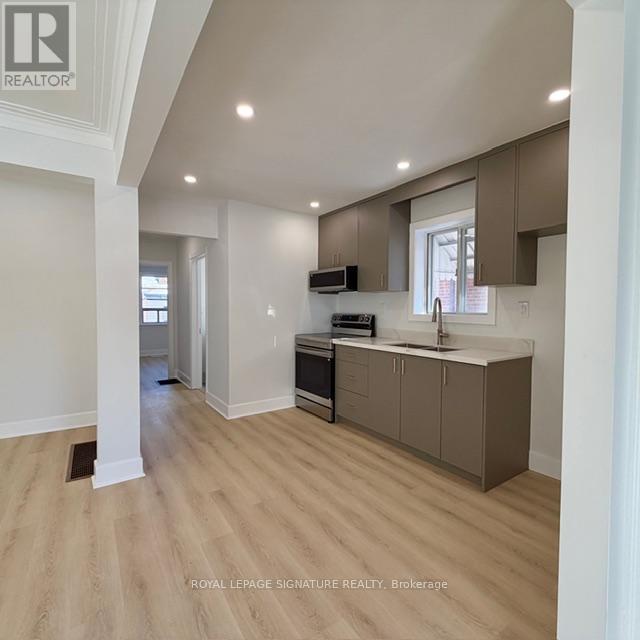 Main - 293 Glebemount Avenue, Toronto, Ontario  M4C 3V4 - Photo 6 - E12775820