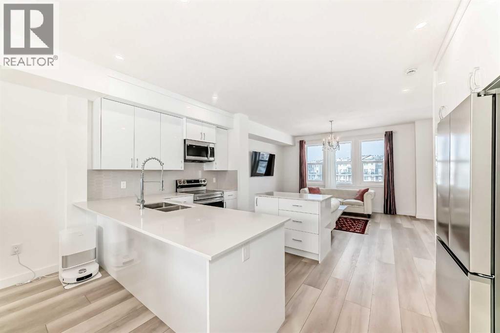 205, 33 Merganser Drive W, Chestermere, Alberta  T1X 2S2 - Photo 4 - A2281064