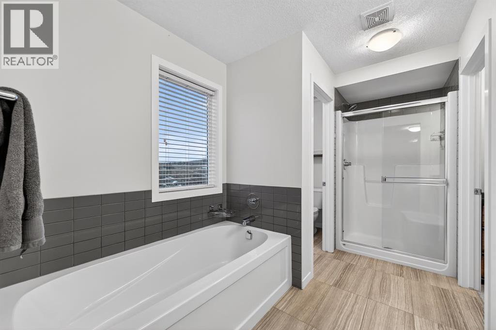 73 Fireside Cove, Cochrane, Alberta  T4C 0X3 - Photo 20 - A2278429